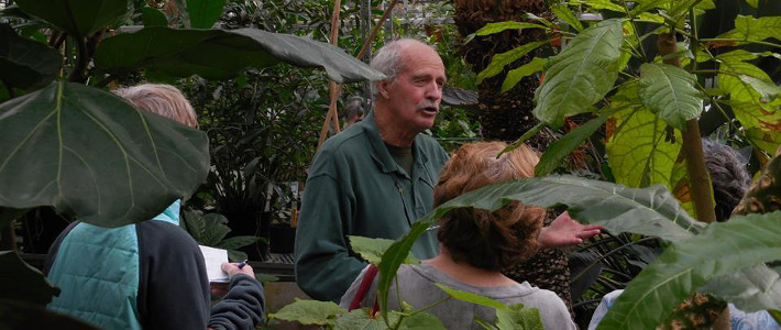 Professor Emeritus Terry Webster leads Greenhouse Friday tour